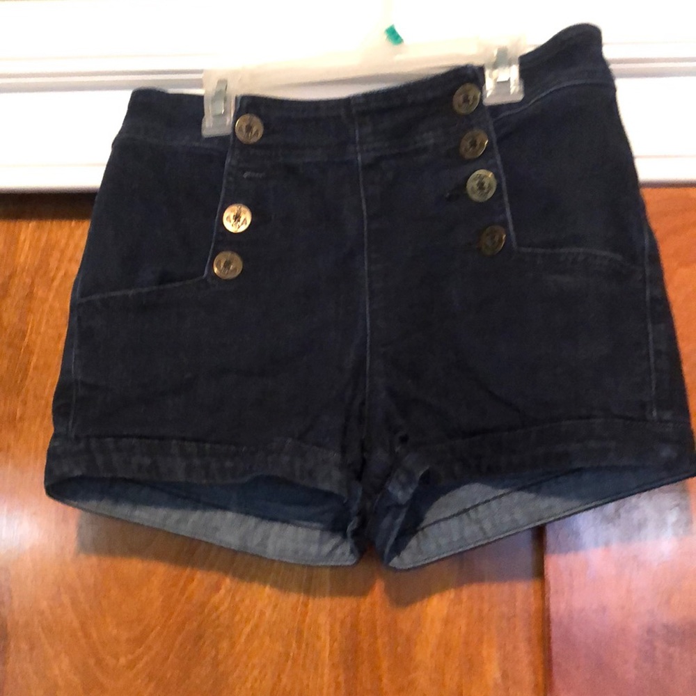 Dark wash, high waisted shorts. Stretch